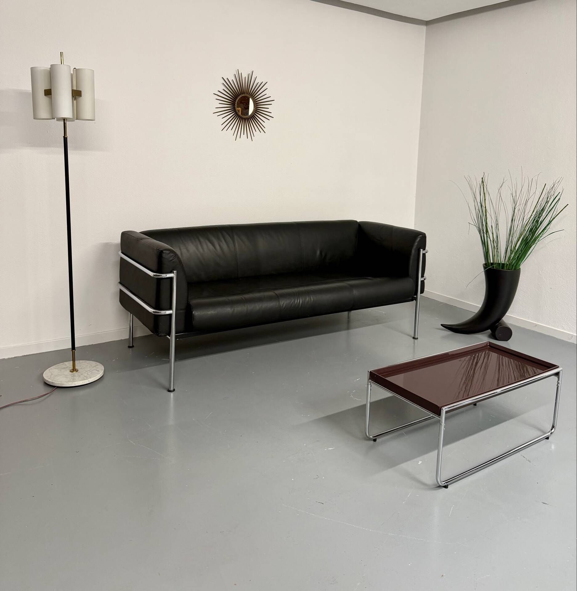 Three-seater tubular chrome and black leather sofa by Kébé, Denmark 80