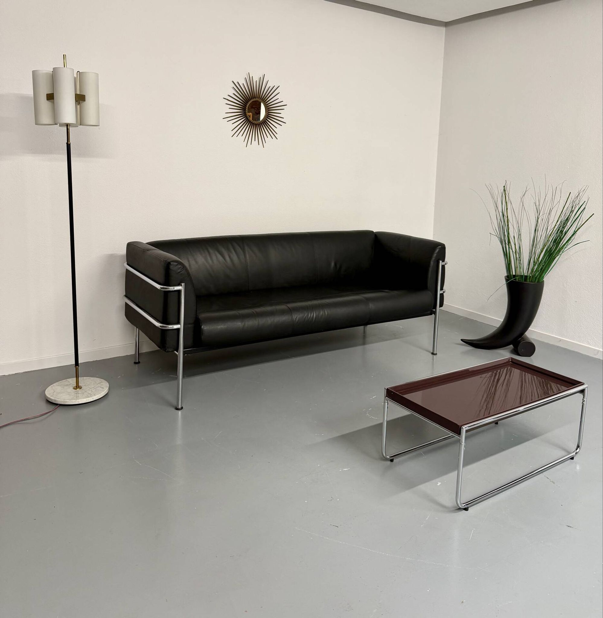 Three-seater tubular chrome and black leather sofa by Kébé, Denmark 80