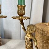 Pair of bronze “Cherubim” candlesticks