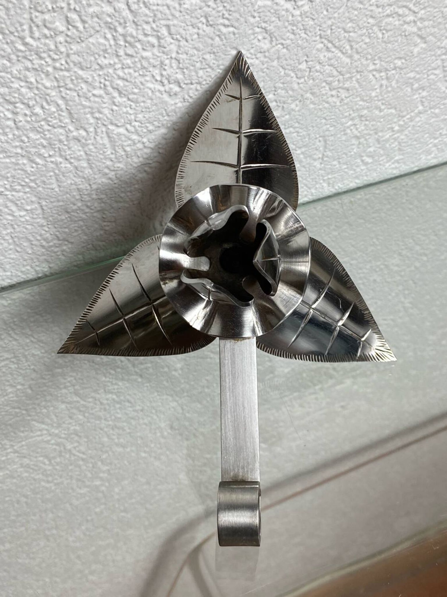 Silver-plated metal flower candle holder