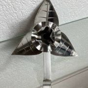 Silver-plated metal flower candle holder