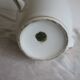 Antique coffee pot in white Limoges porcelain with floral motifs