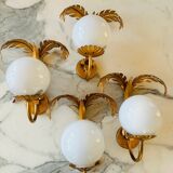 Pair of palm leaf wall lights in Hollywood Regency style with opaque globes by Hans Kögl, Germany, 1970s.