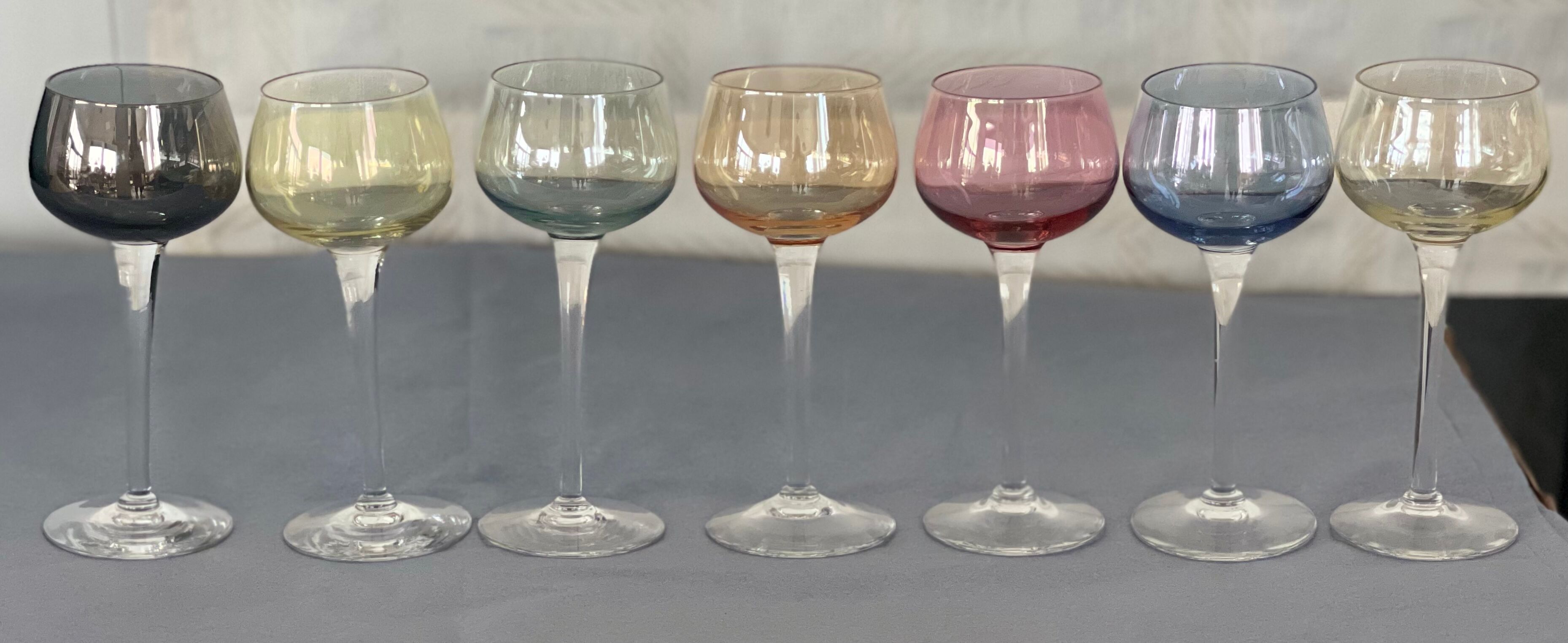 7 vintage iridescent foot glasses