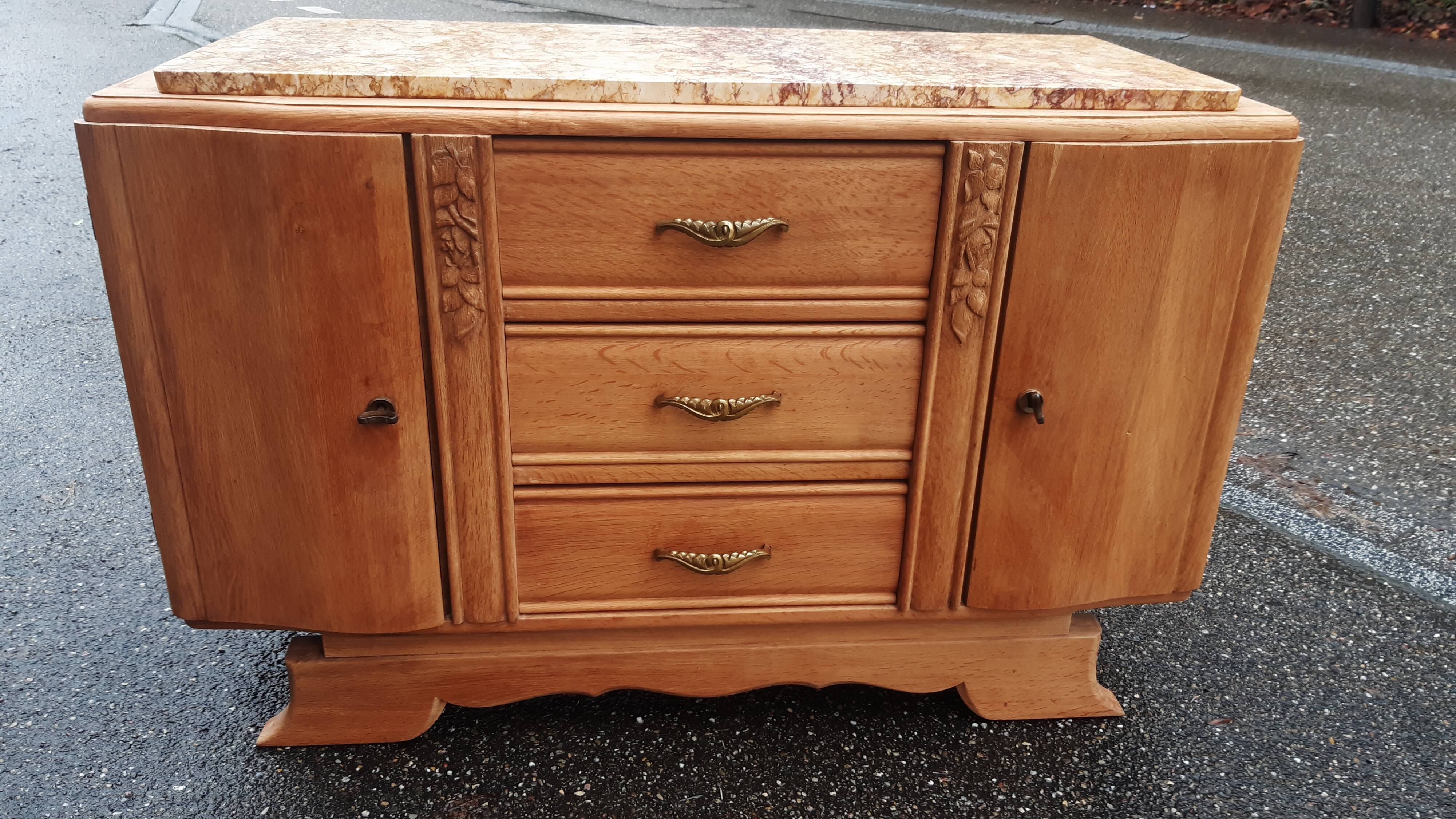 Art Deco buffet in raw oak wood.