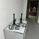 Pair of designer cast iron andirons