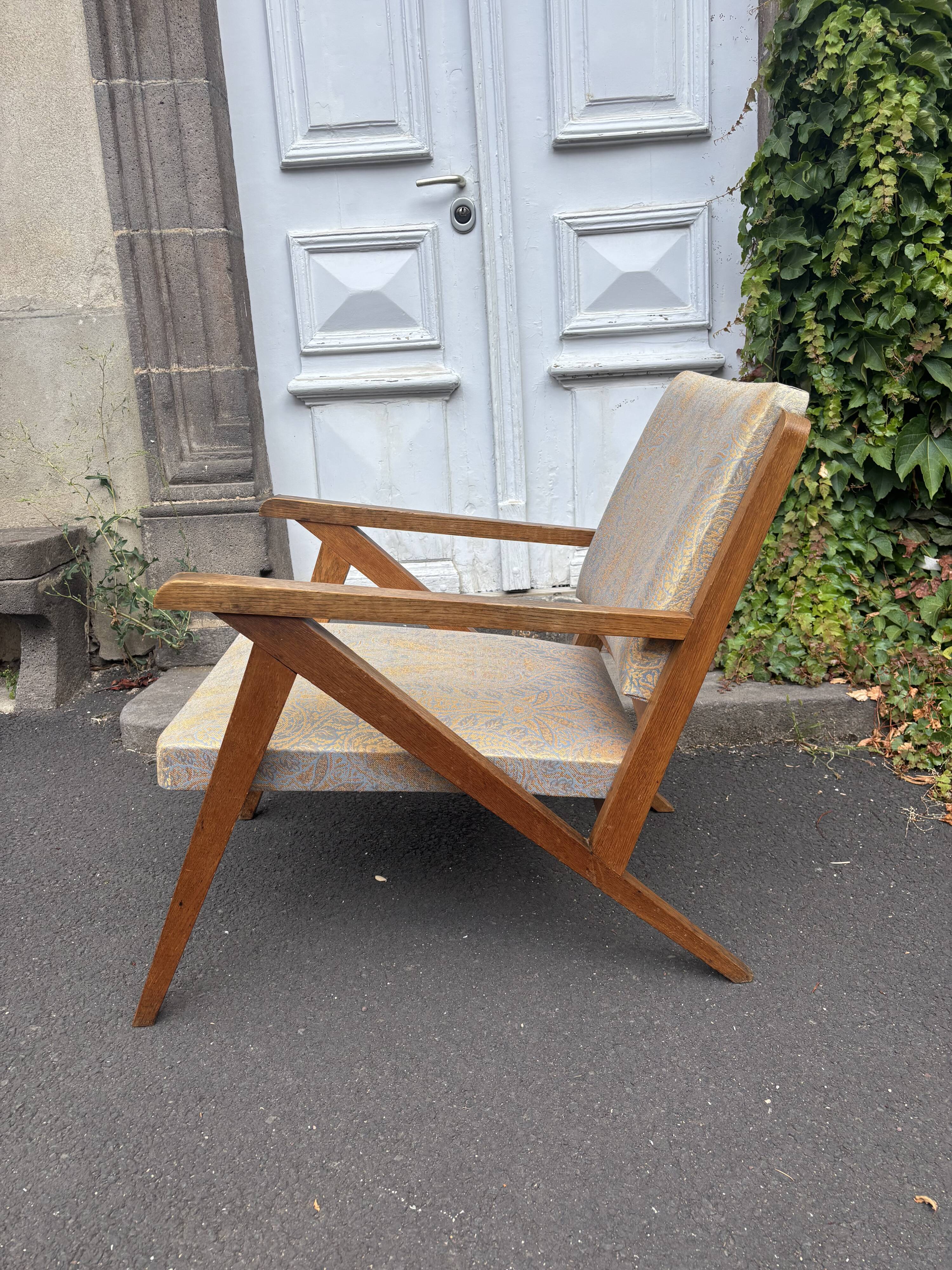 Vintage wooden armchair from the 1960s