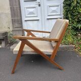 Vintage wooden armchair from the 1960s