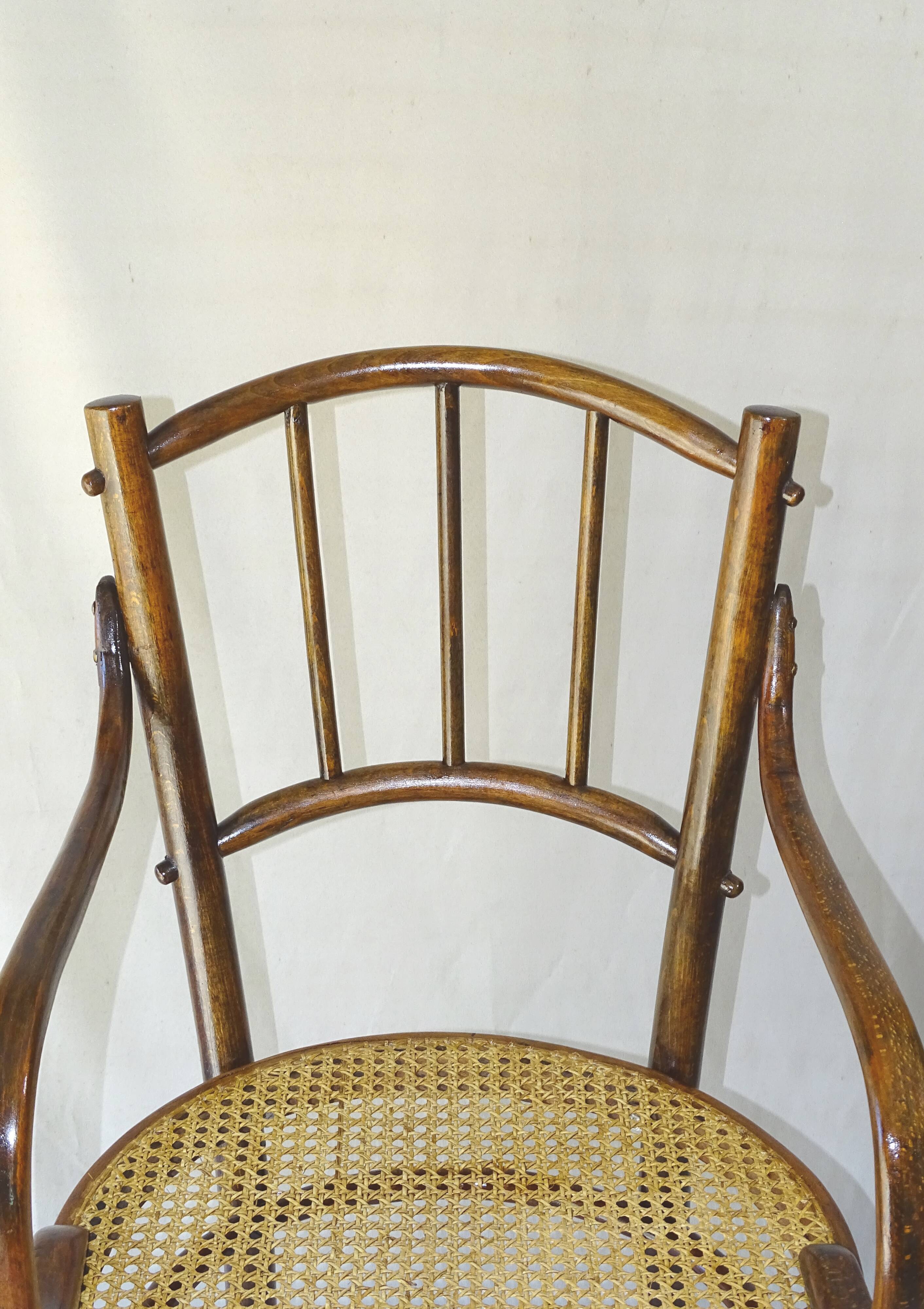Small canned armchair; in curved wood, bistro, 1890