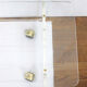 Table basse en plexi thermoformé transparent, sur roulettes