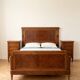 Double bed in Art Deco style with thuya burl wood and two bedside tables.