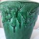 Green ceramic cache-pot