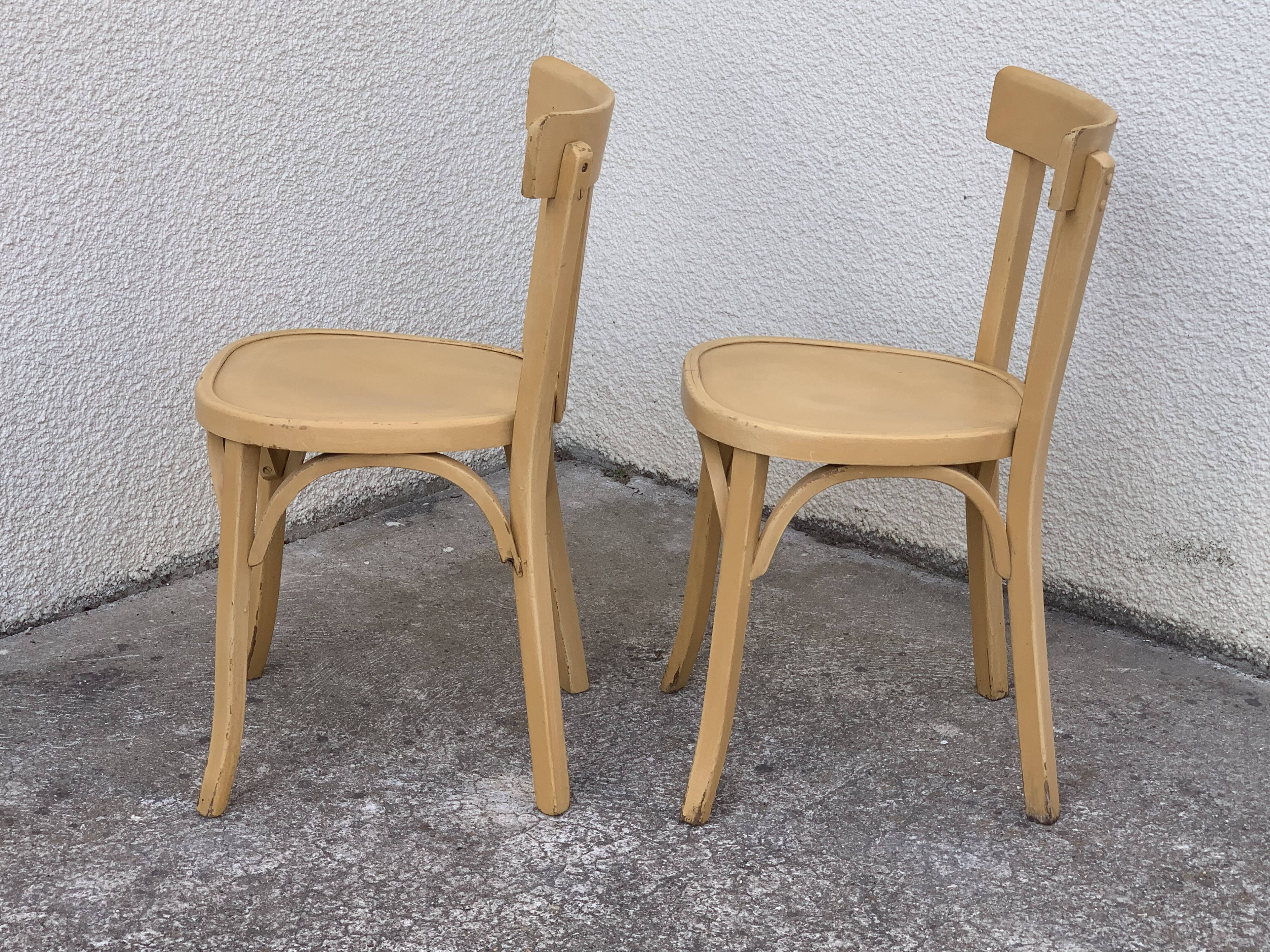 Paire de chaises bistrot Baumann patine vintage
