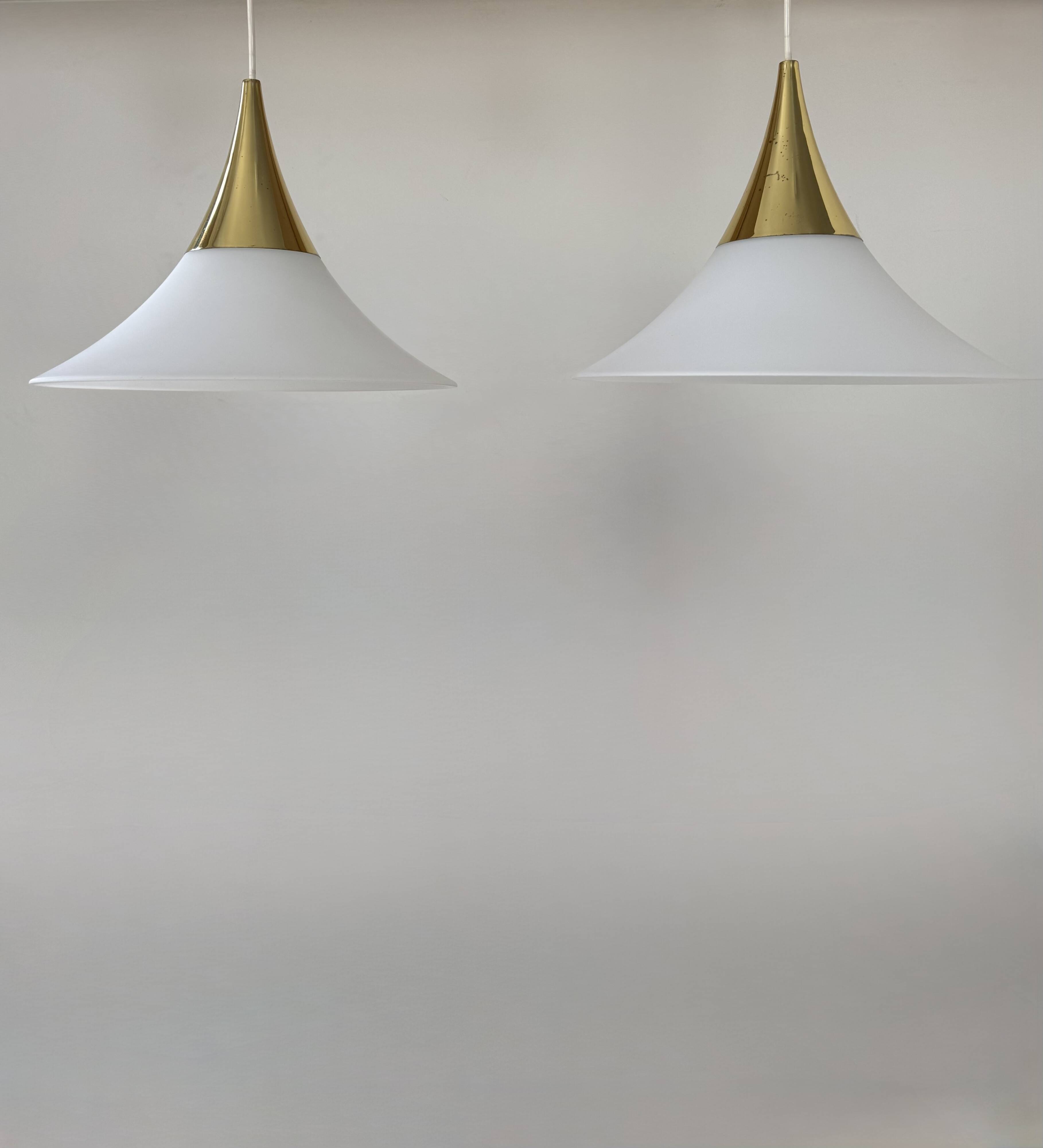 Vintage Limburg brass and opaline pendant lights, Germany, 1970.