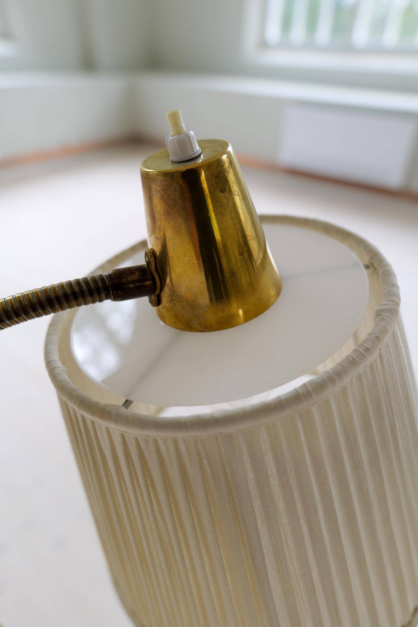 Mid-century brown leather and brass floor lamp, Falkenbergs Belysning, Sweden, 1960s.