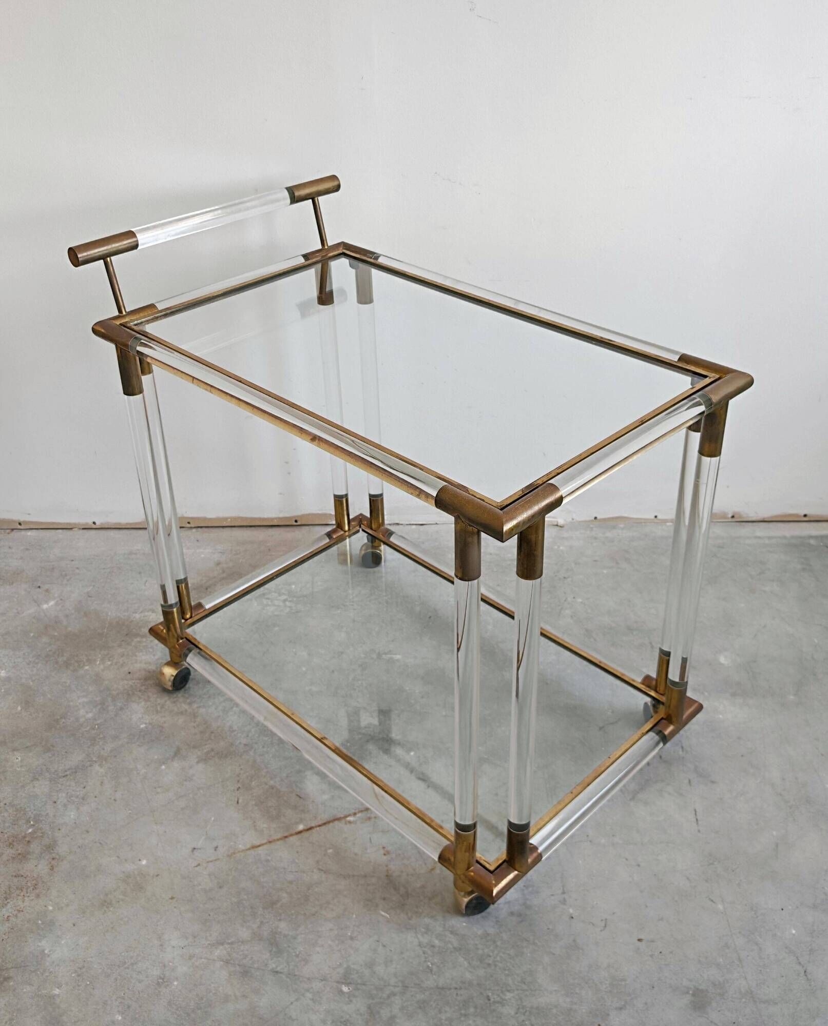 Modern mid-century bar cart in lucite, bronze, and glass, 1970s