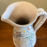 Pitcher with naive bird decor