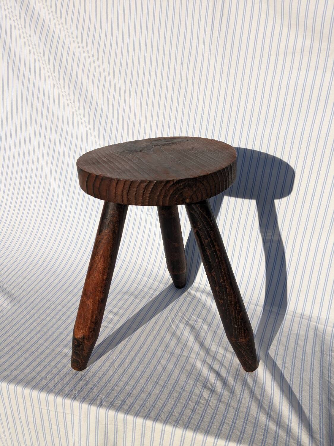 Wooden tripod stool