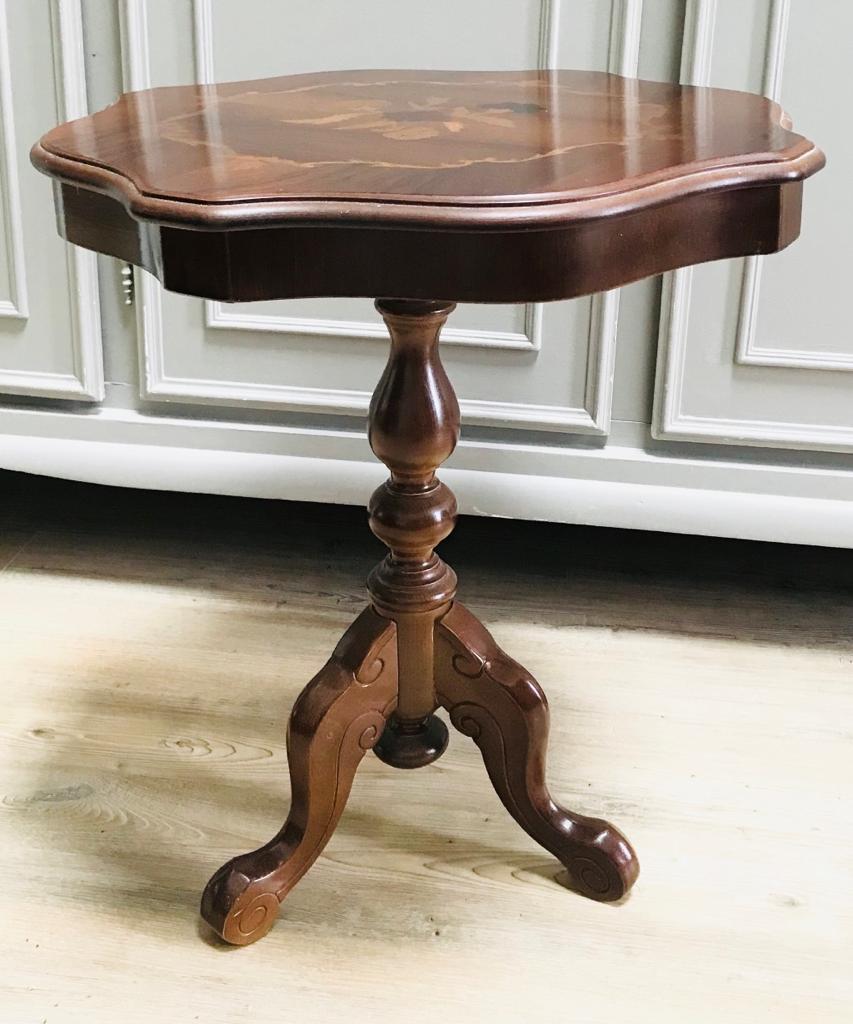 Pedestal table in cherry tree