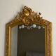 Late 19th century gilded mirror with decorated pediment 125x70cm