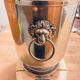 Silver-plated champagne bucket with lion heads from the 20th century, stamped.