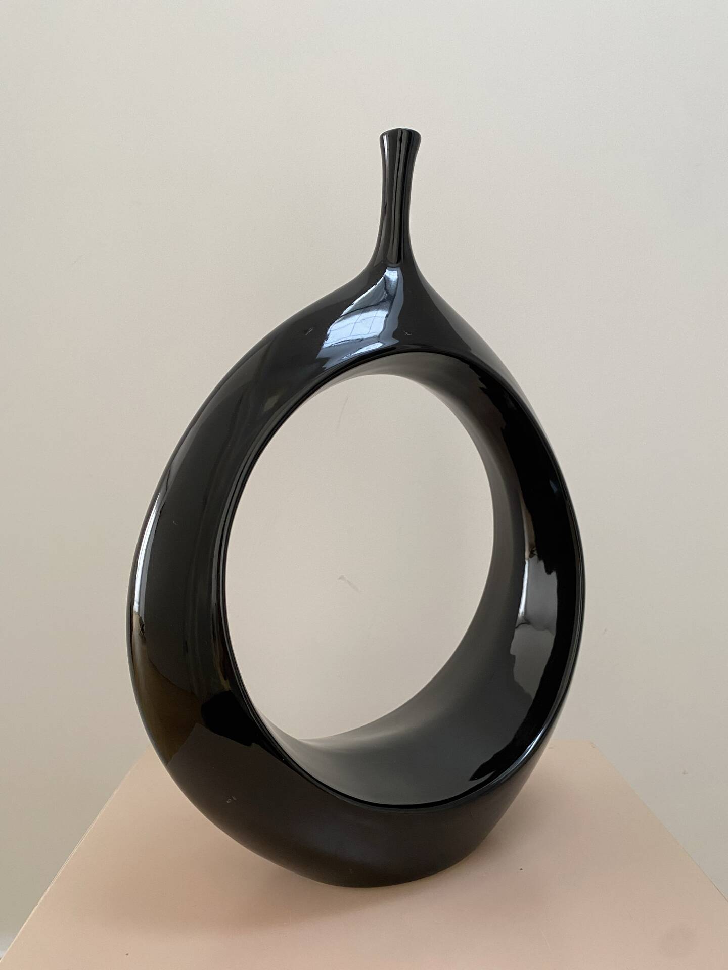 Sculptural black ring vase in ceramic