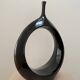Sculptural black ring vase in ceramic