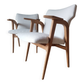 Scandinavian armchairs by Roger Landault in white.