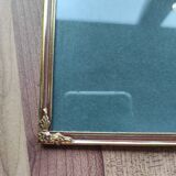 Vintage photo frame in gold and decorated metal