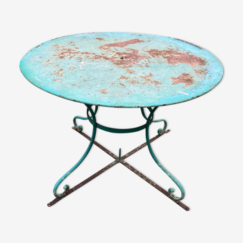 Green wrought iron garden table