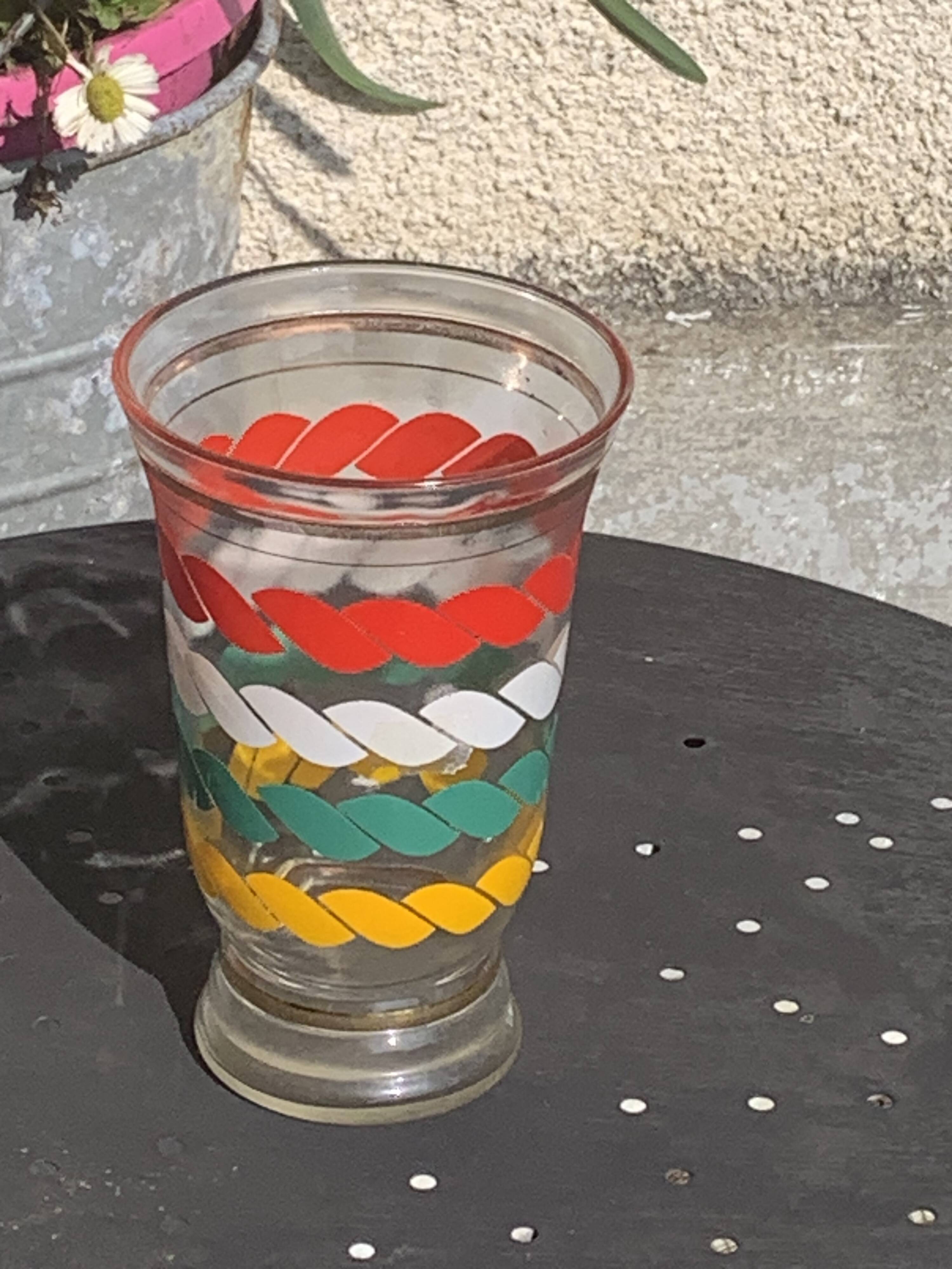 Transparent and gold glass vase and red, white, green and yellow silkscreen lines vintage 1960