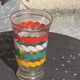 Transparent and gold glass vase and red, white, green and yellow silkscreen lines vintage 1960