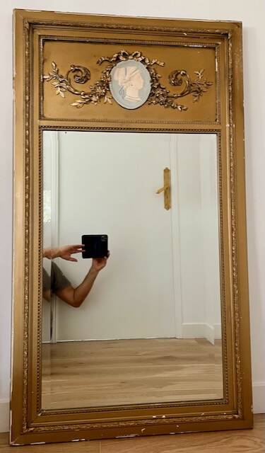 Antique gilded trumeau mirror in Louis XVI style