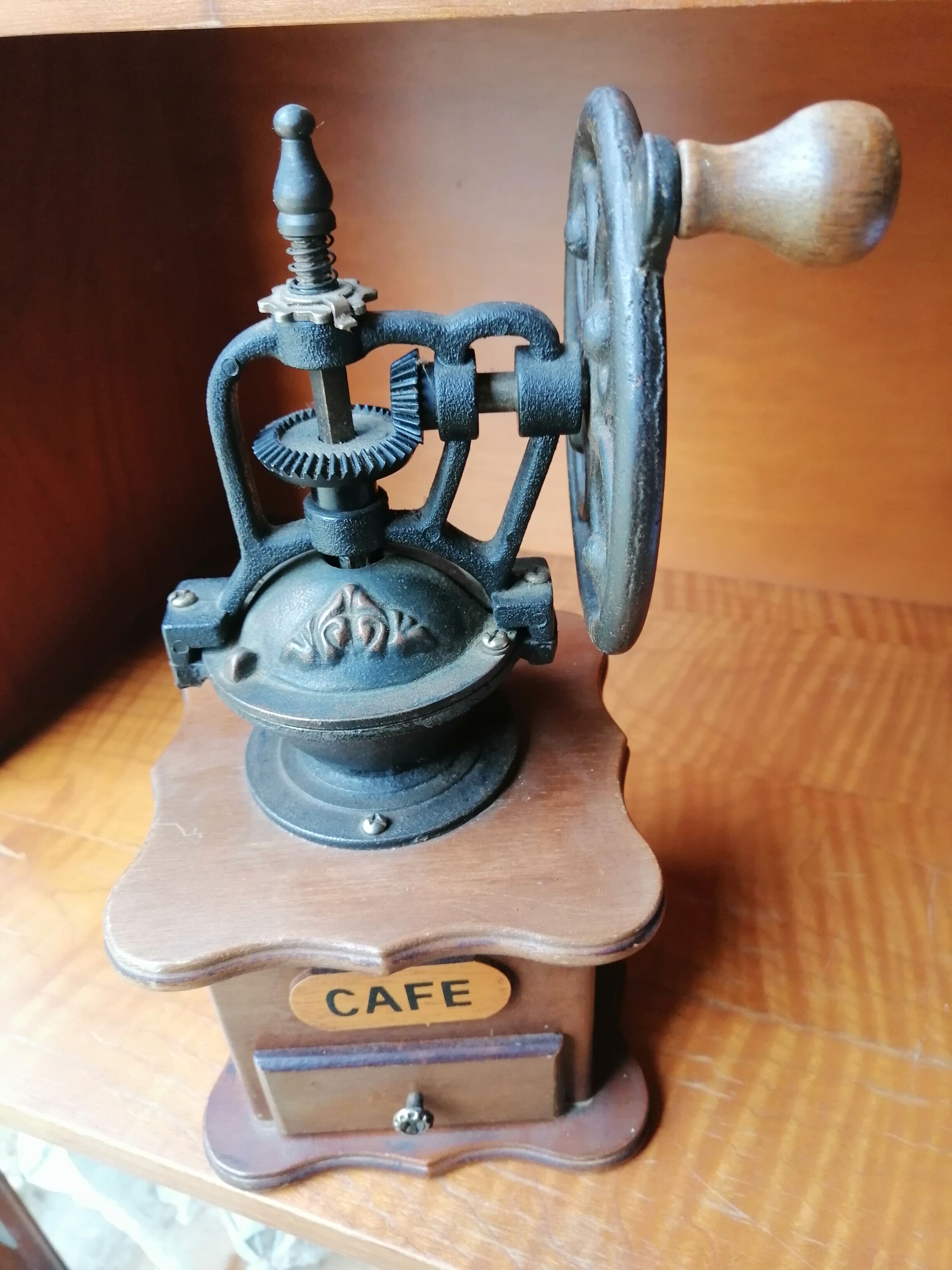 Coffee mill in wood and metal style antique countertop