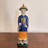 Chinese Porcelain Sculpture of a Manchu Mandarin Qing Pipe Smoker