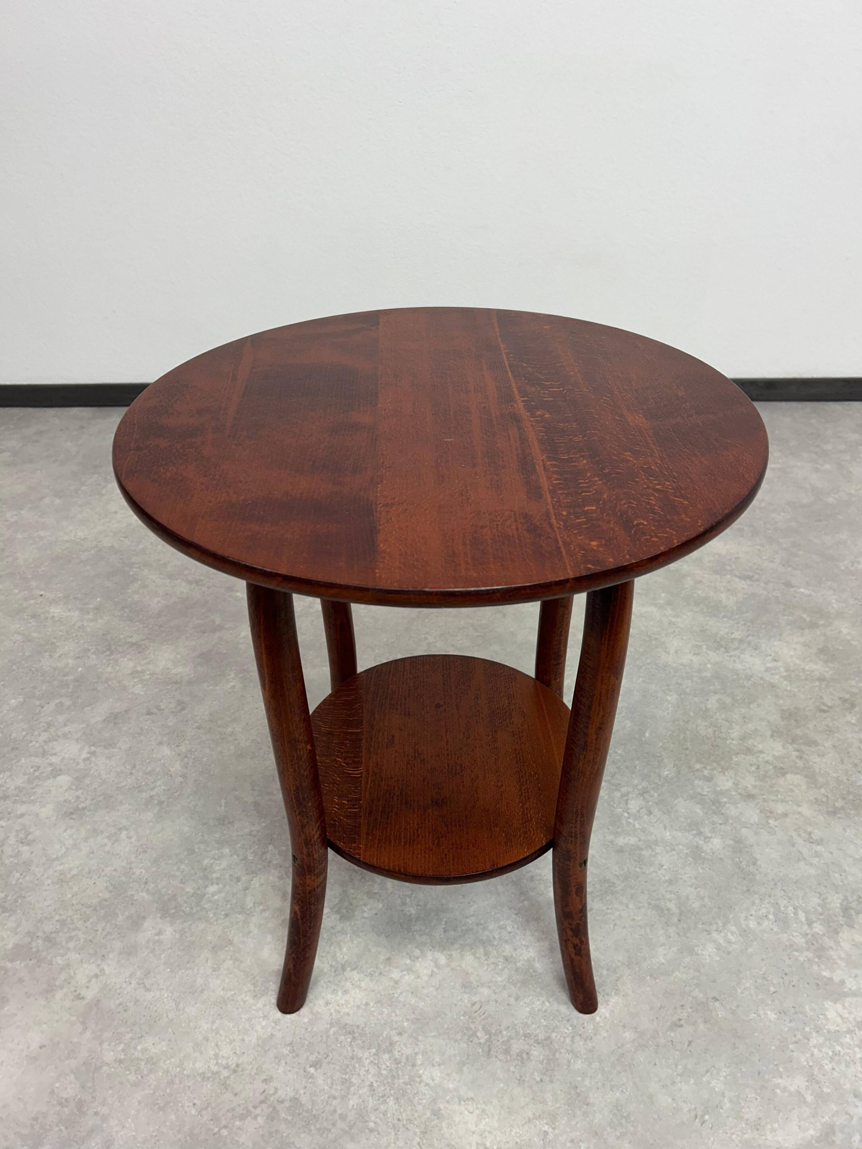 Curved wooden coffee table by Thonet