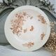 Antique iron earthenware plates accompanied by dishes