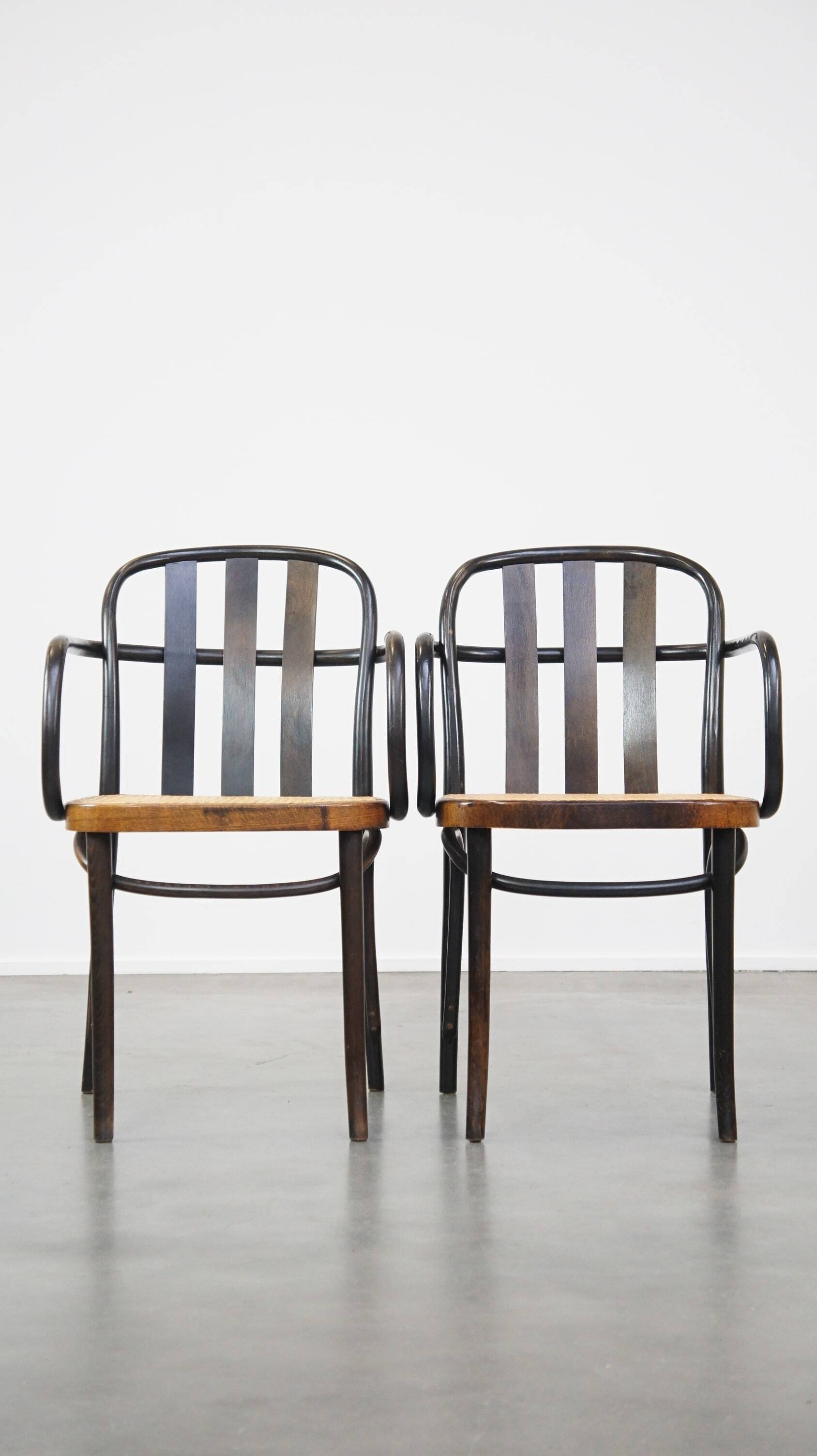 Set of 4 vintage wooden design dining/bistro chairs with woven seats