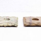 Pair of brutalist travertine candle holders