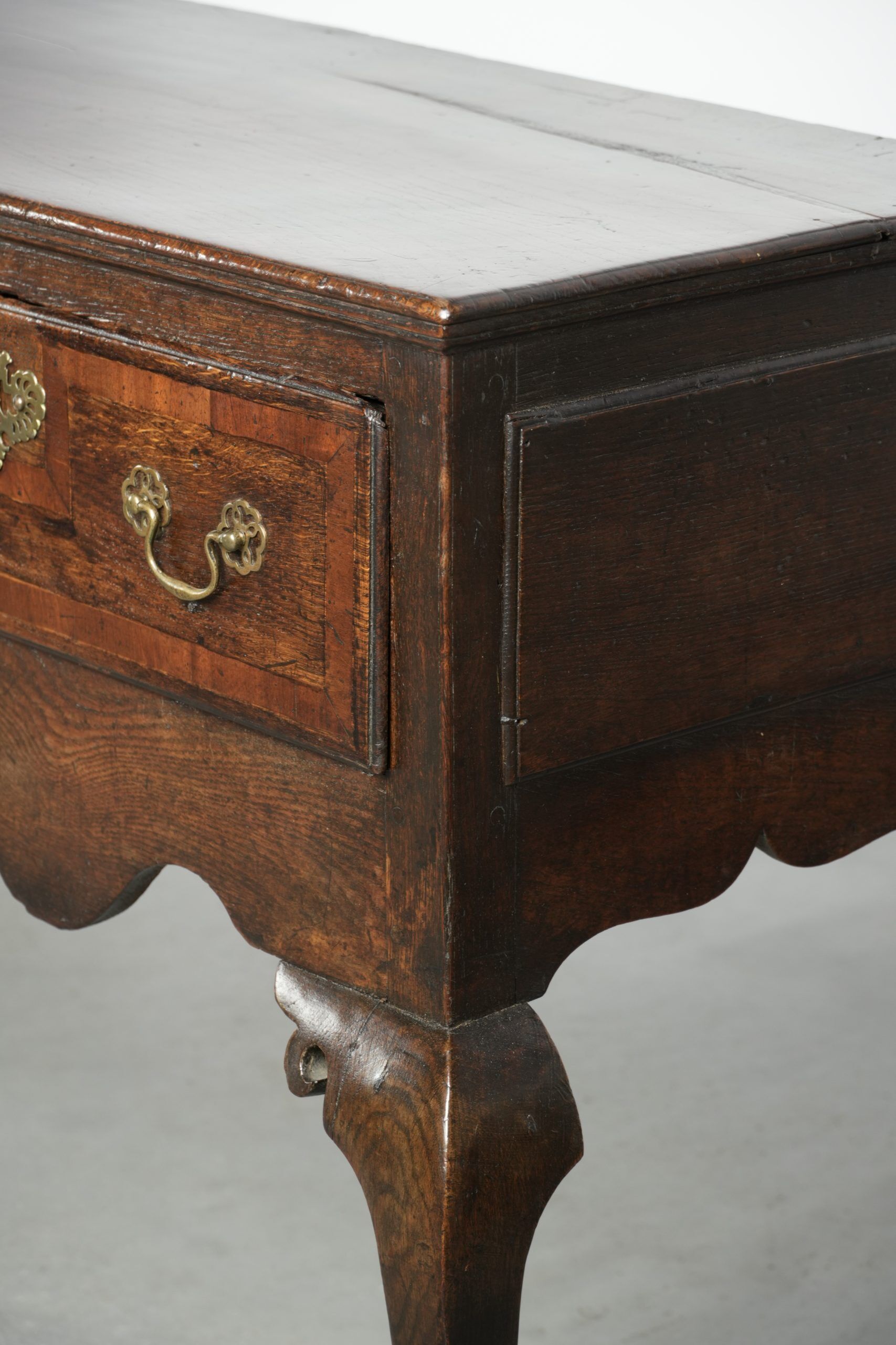 Large antique English oak sideboard from the 18th century with elegant legs