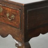 Large antique English oak sideboard from the 18th century with elegant legs
