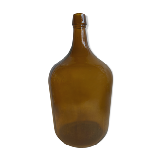 Demijohn in brown molded glass