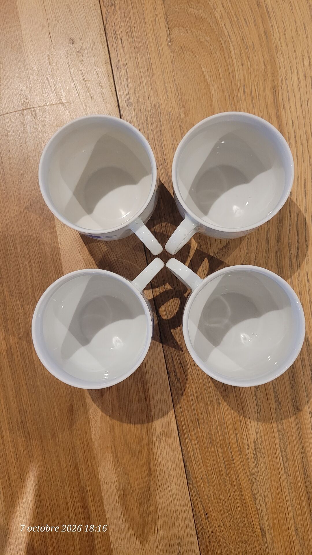 4 vintage coffee cups and their saucers