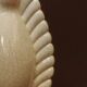 Neo-Art Deco white crackled ceramic vase with raised palmettes