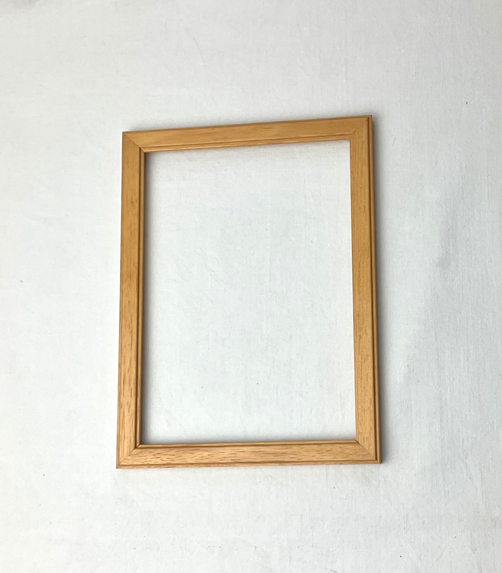 Old frame in light wood