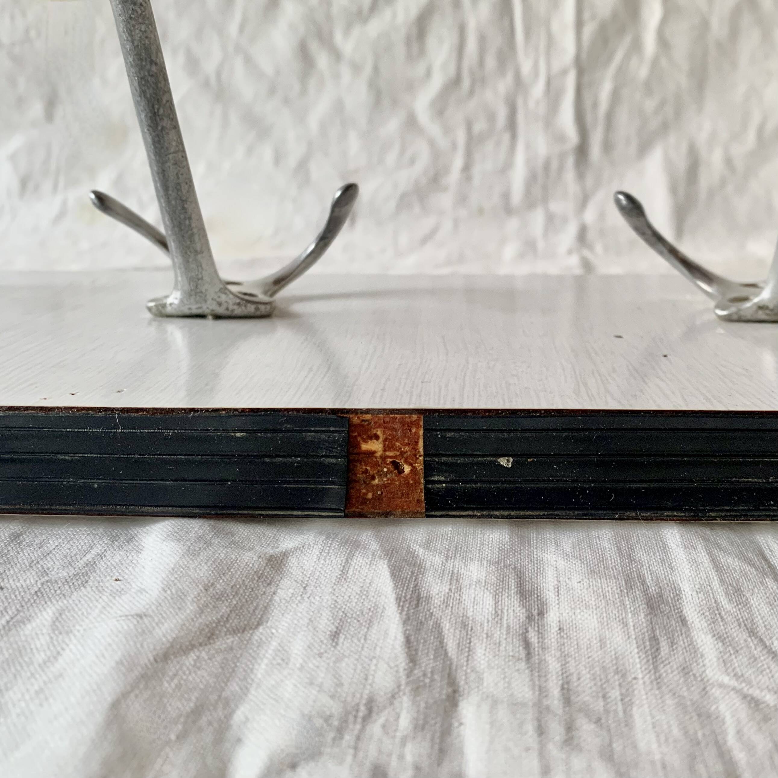 Vintage wall coat rack in white Formica - 4 cast aluminum coat hooks