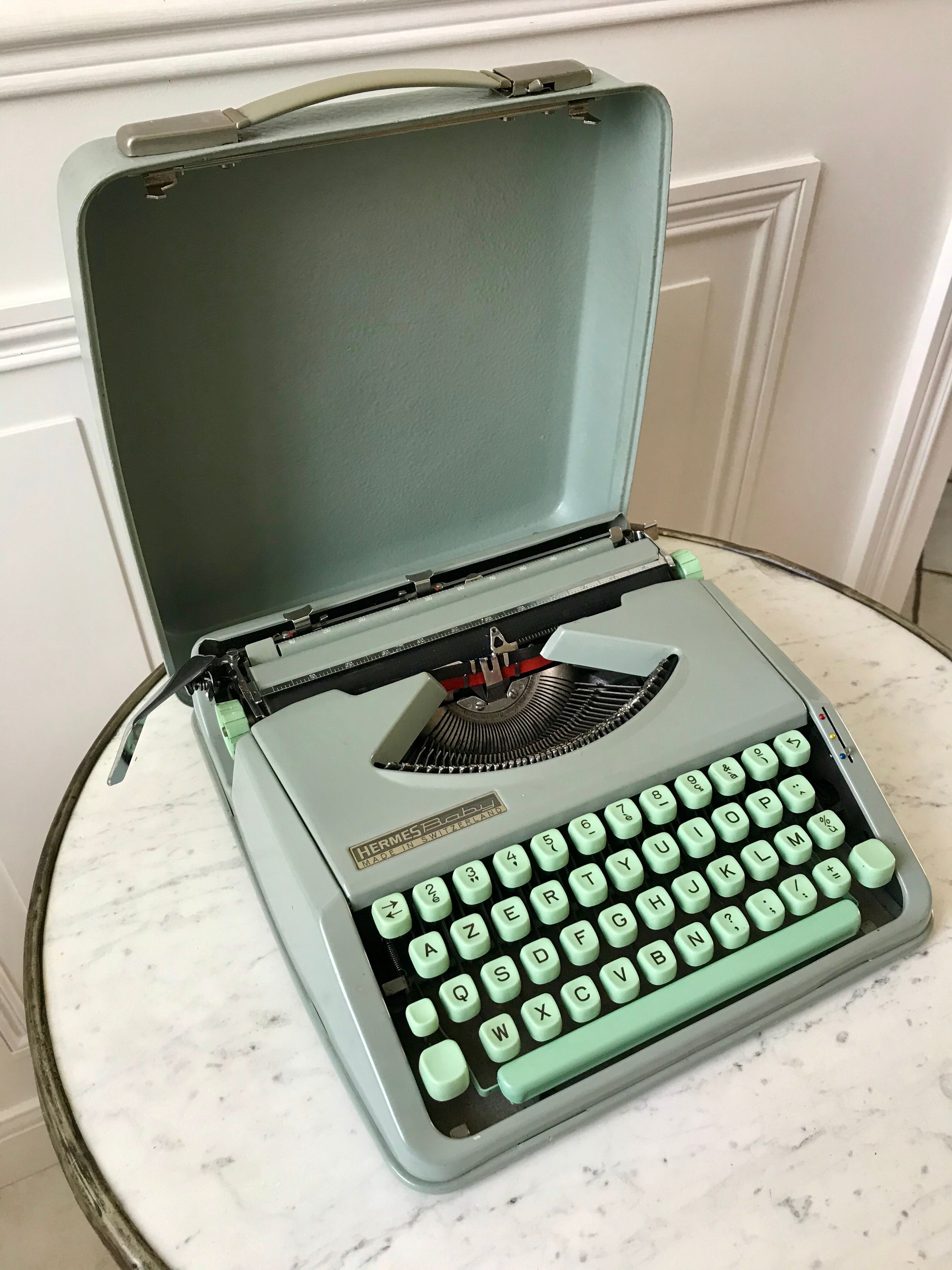 Mint green typewriter hermes baby made in switzerland