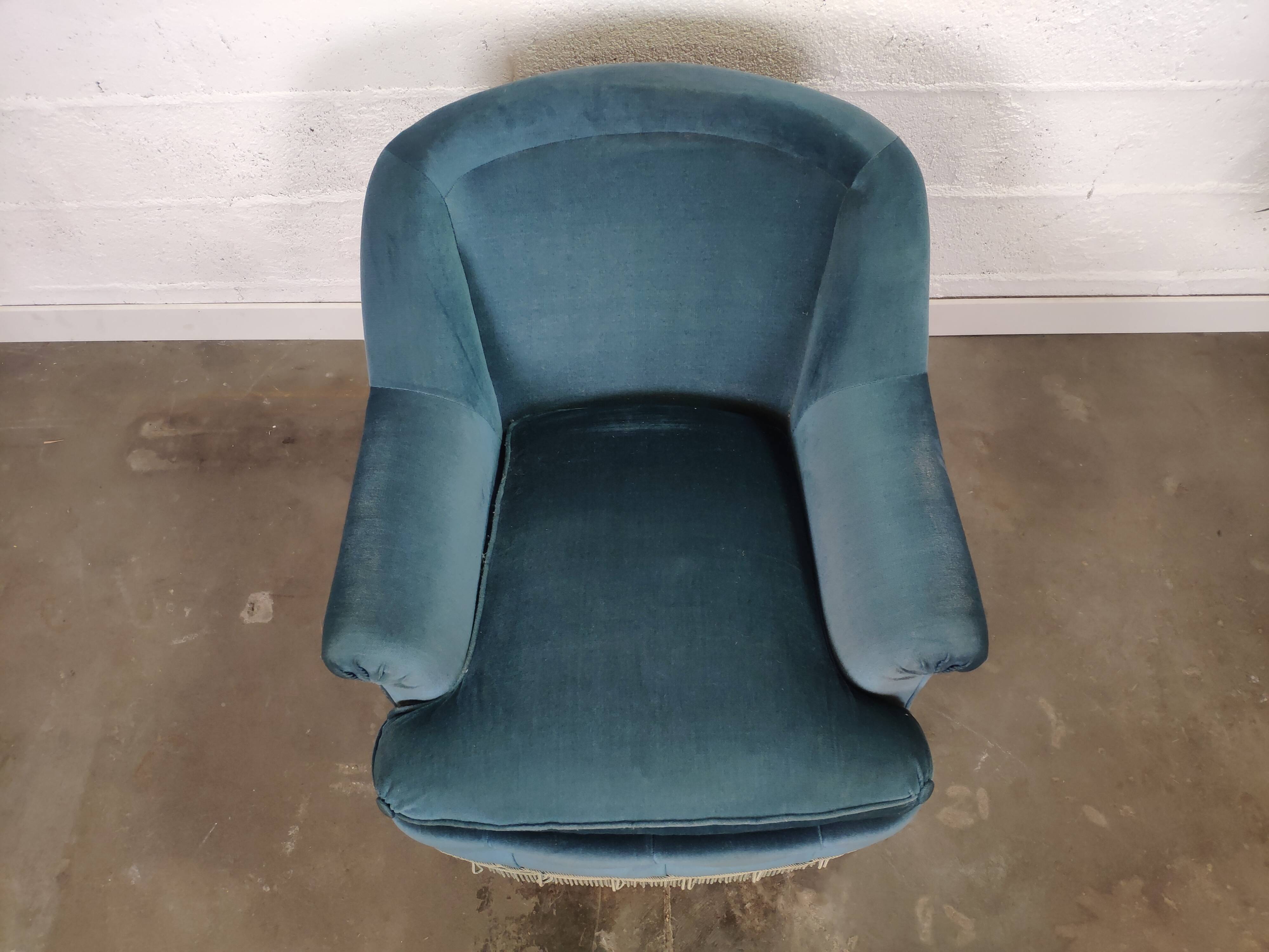 Pair of blue velvet armchairs with fringes