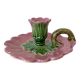 Antique slip candlestick depicting a flower