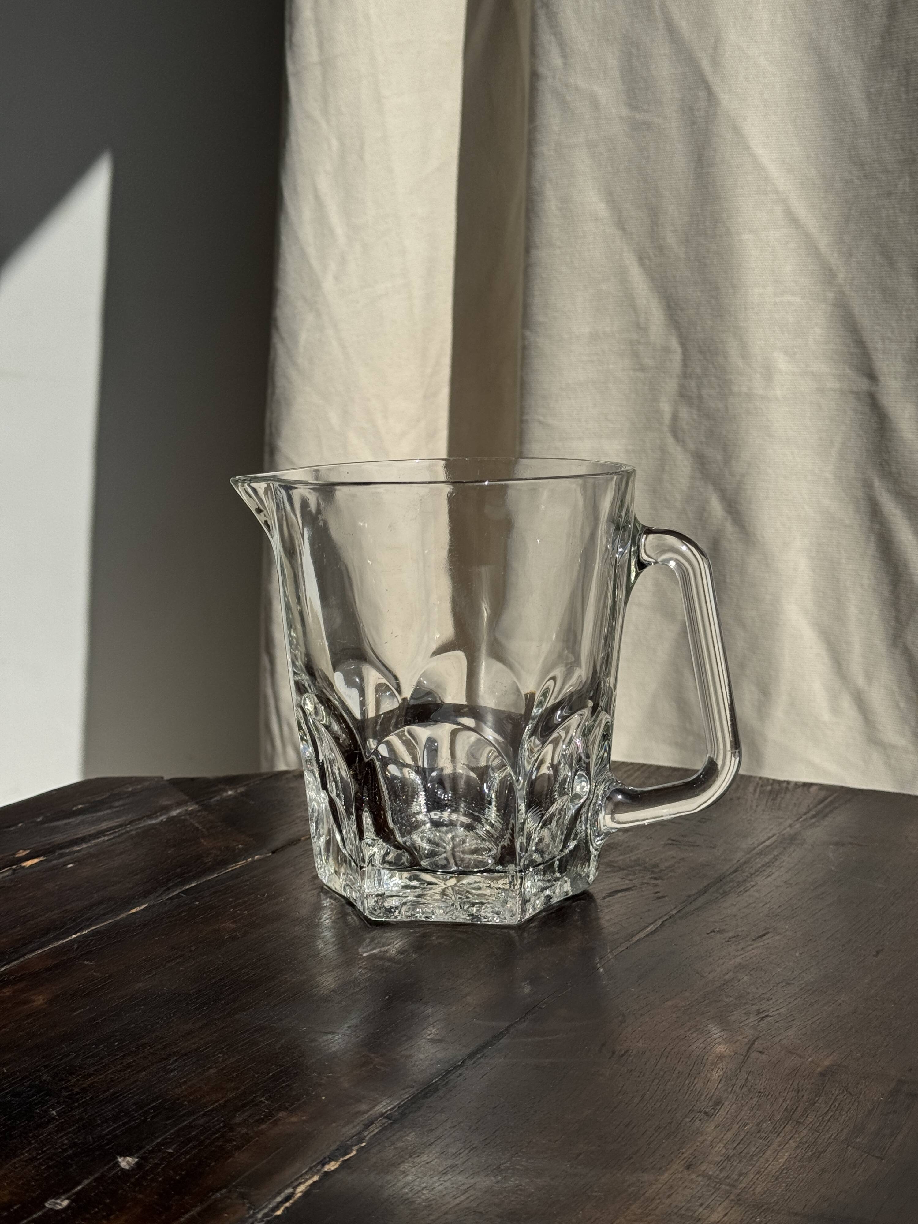 Large glass water jug with handle, hexagonal base, H15 D20.